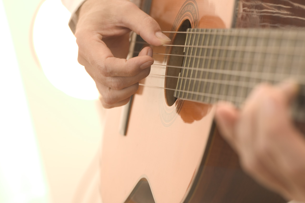 Strumming an Acoustic Guitar